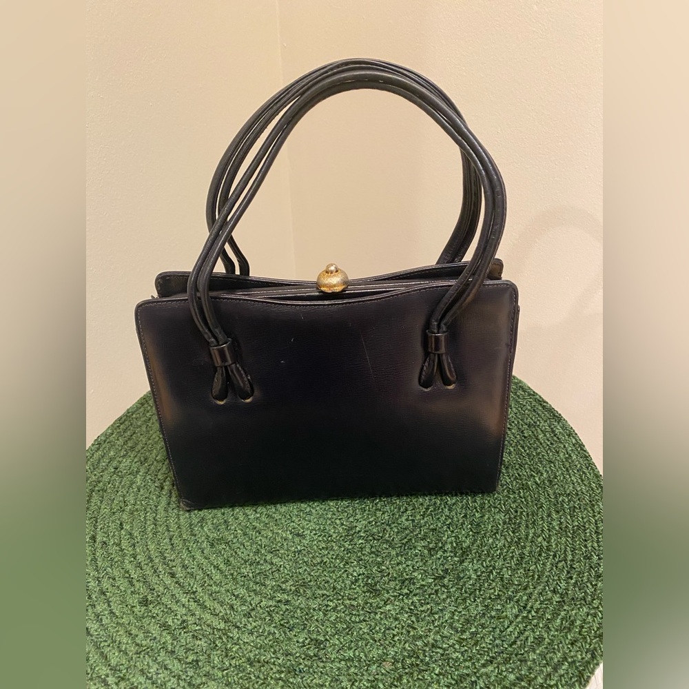 Navy vintage small purse. Double straps with gold knob.